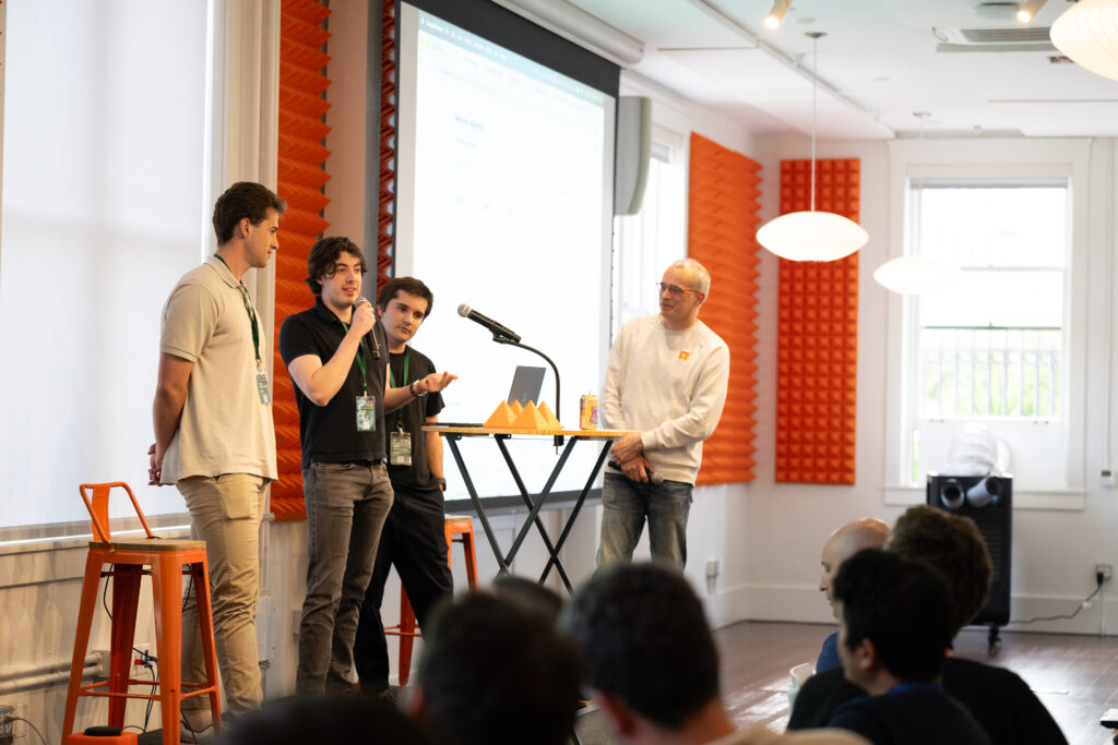 Arnau Ayerbe, Bergen Merey, and Pablo Jiménez de Parga pitching at Y Combinator